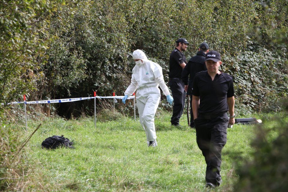  Police search woods for clues after a girl was raped by two attackers in Oxford