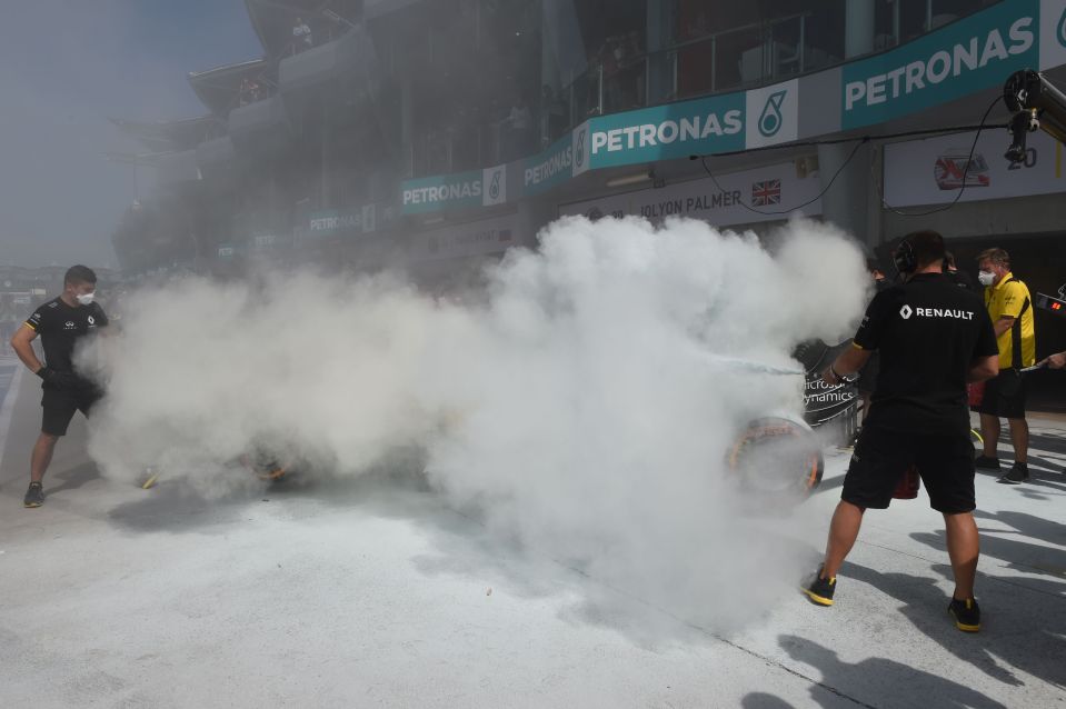  Stewards and mechanics hosed the machine with fire-extinguishers