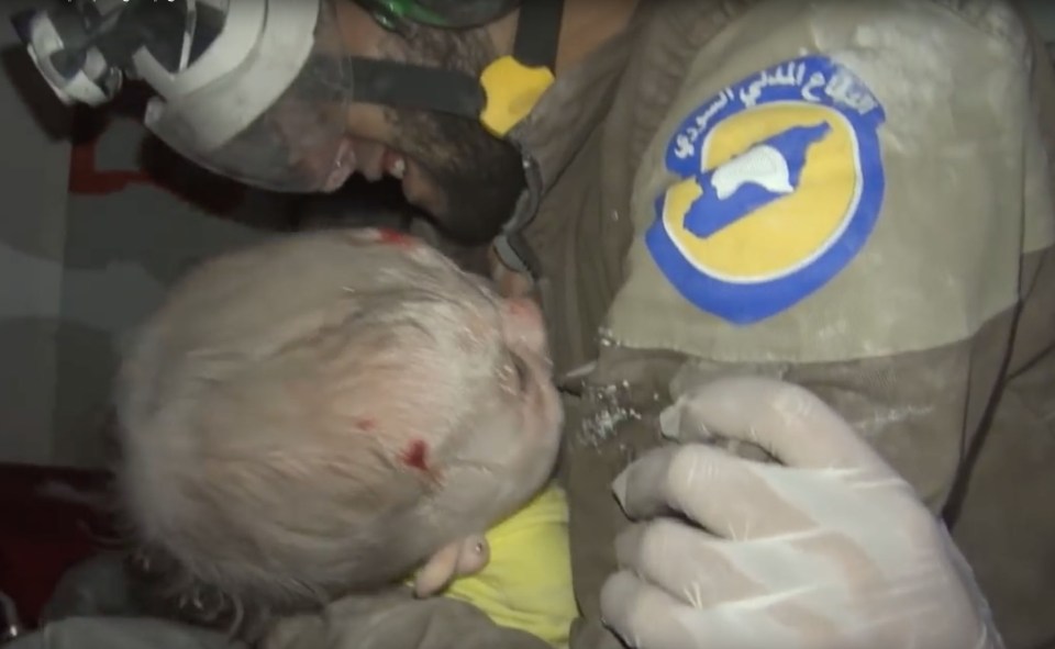 Footage showed a volunteer rescue worker pulling a 30-day-old baby girl alive from the rubble of a house