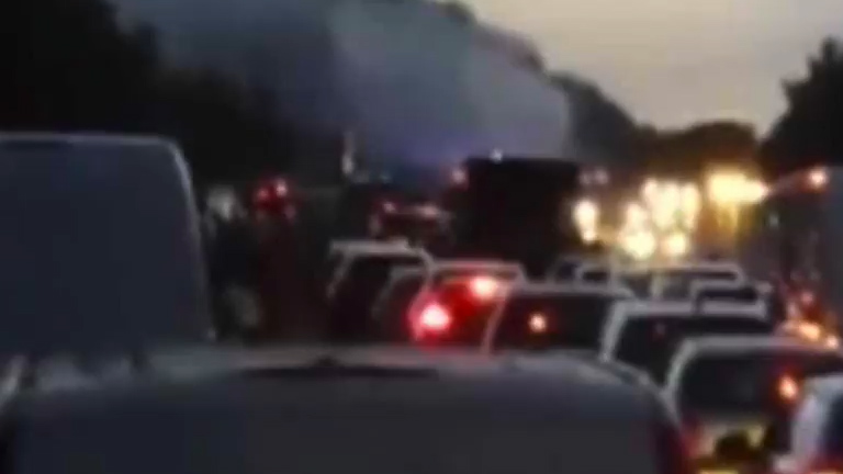 Chaos ... Footage shows lengthy queues as lanes were blocked by blazing car