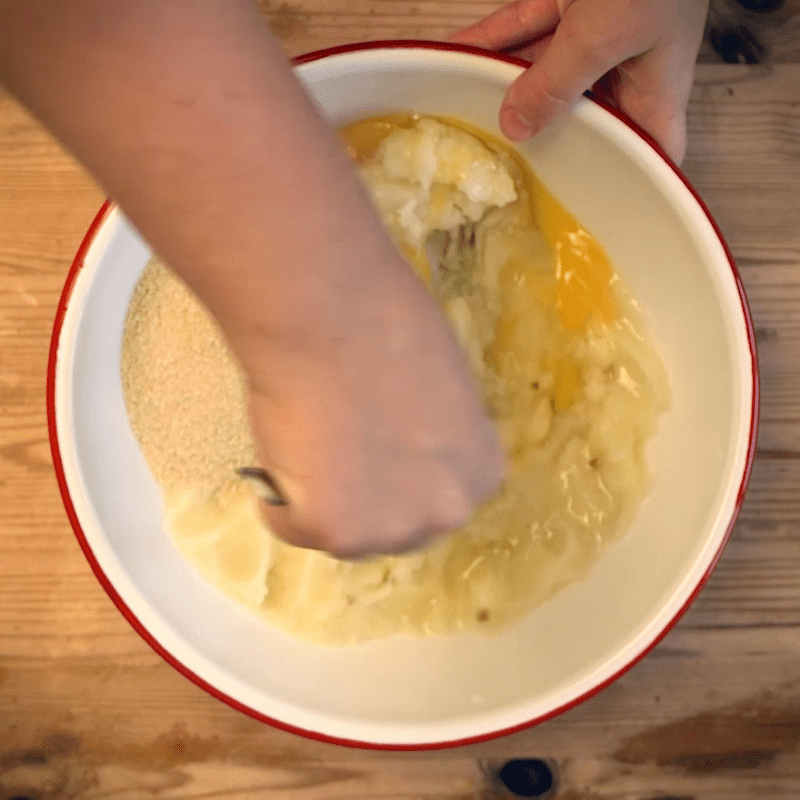  Crack the egg and mix into the potato until well combined