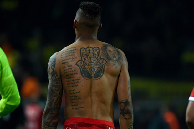 Jerome Boateng has a his daughter Lamia's face inked on his back, as well as the names of 21 family members