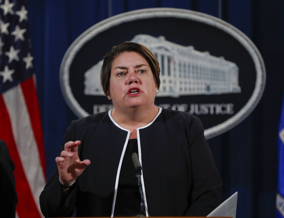 Assistant Attorney General Leslie R. Caldwell of the Criminal Division, gestures during a news conference at the Justice Department in Washington, Thursday, Oct. 27, 2016. The Justice Department is announcing charges in connection with a call center operation said to be based in India. Federal prosecutors have unsealed an indictment charging 61 defendants in the United States and abroad, including five call center groups. The department says the extorted funds ended up being laundered with the help of prepaid debit cards. Arrests are taking place throughout the United States. (AP Photo/Pablo Martinez Monsivais)