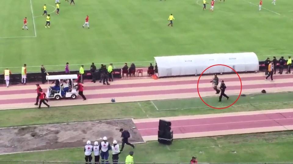  Police made a dash to catch up with the departing stretcher as Enner Valencia was given an oxygen mask