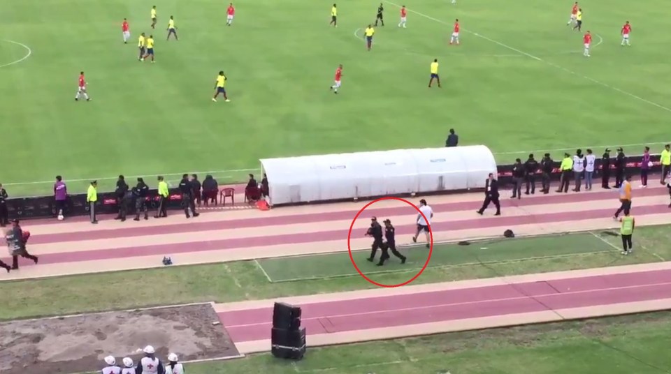  Police keep a close eye on Enner Valencia as he leaves the stadium