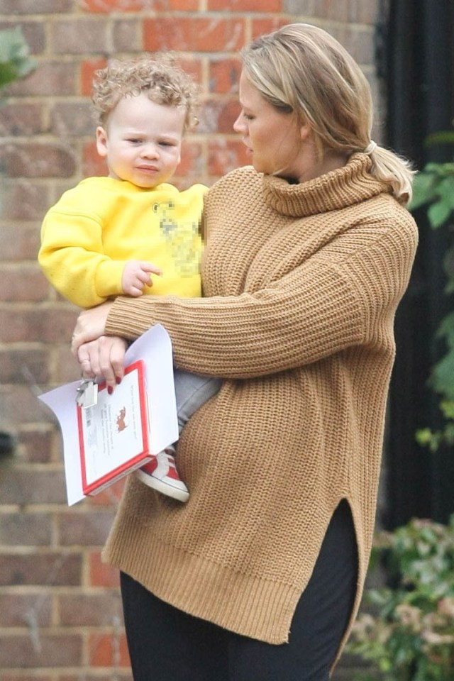 Little Bobby sported a yellow jumper with a picture of a teddy bear