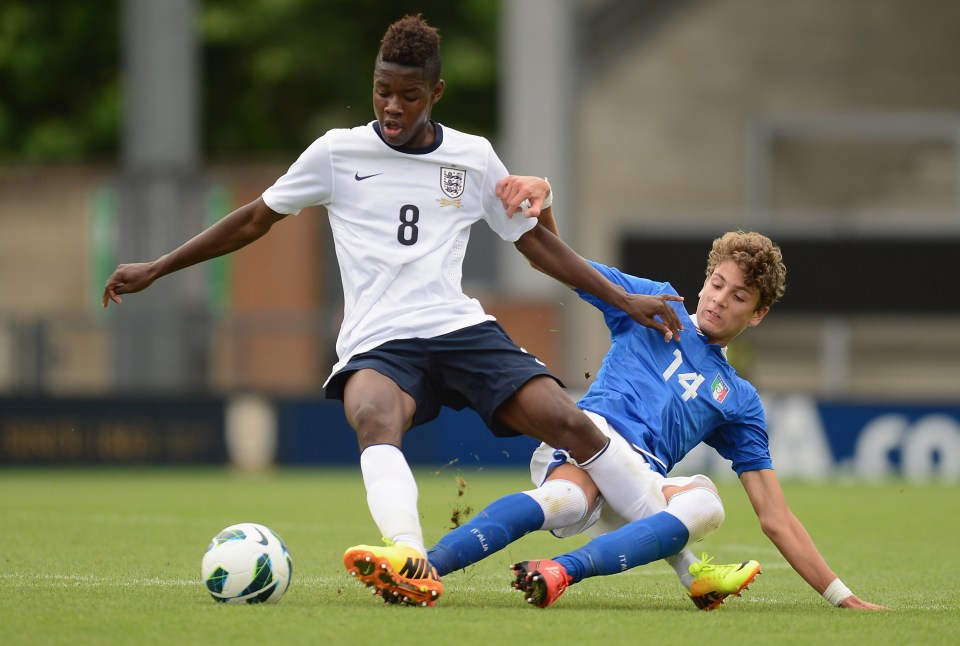  Josh Onomah in action against AC Milan's Manuel Locatelli for England back in 2013