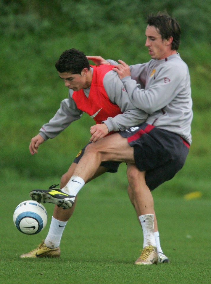 MANCHESTER, ENGLAND - NOVEMBER 2: Cristiano Ronaldo and Gary Neville of Manchester United in action during a first team training session ahead of the UEFA Champions League match against Sparta Prague at Carrington Training Ground on 2 November 2004 in Manchester, England. (Photo by Matthew Peters/Manchester United via Getty Images)