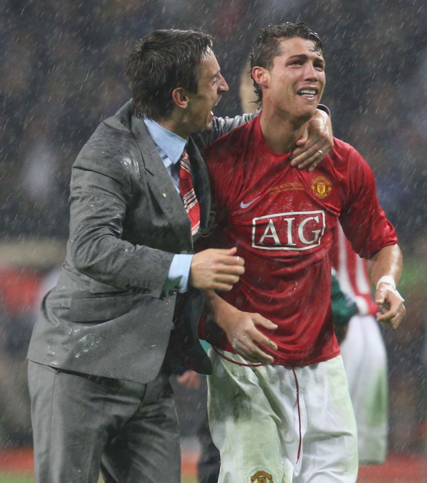 MOSCOW, RUSSIA - MAY 21: Gary Neville and Cristiano Ronaldo of Manchester United celebrate after winning the UEFA Champions League Final match between Manchester United and Chelsea at Luzhniki Stadium on May 21 2008 in Moscow, Russia. (Photo by Chris Coleman/Manchester United via Getty Images)