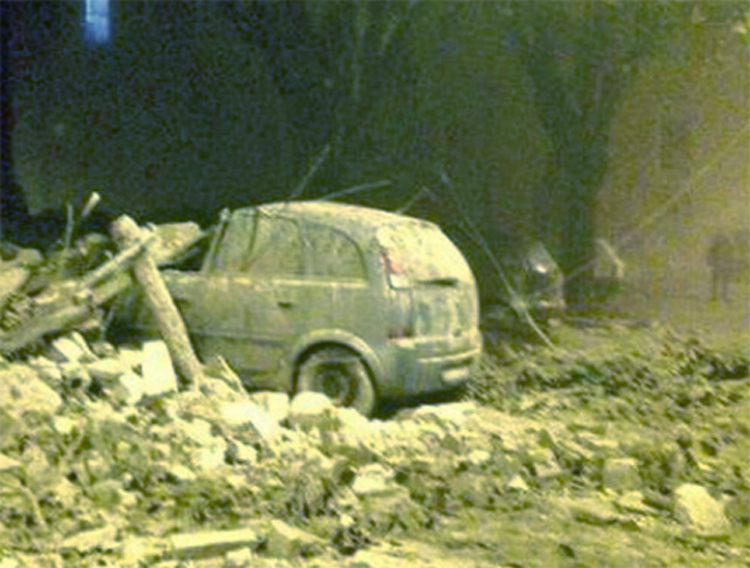  A village street is covered in rubble following the two colossal shakes