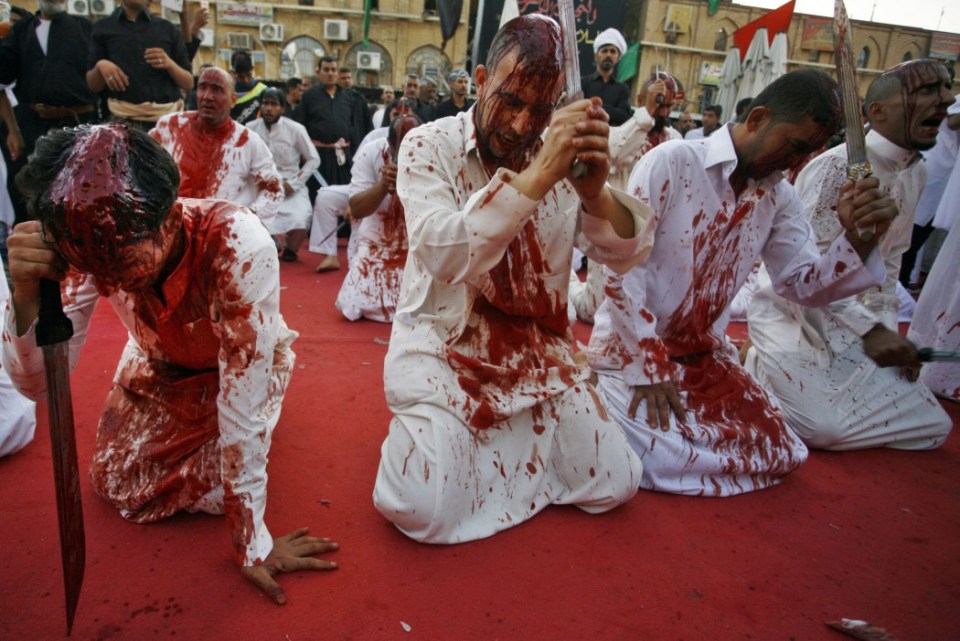  Iraqi Shiite Muslim men are seen after flagellating themselves