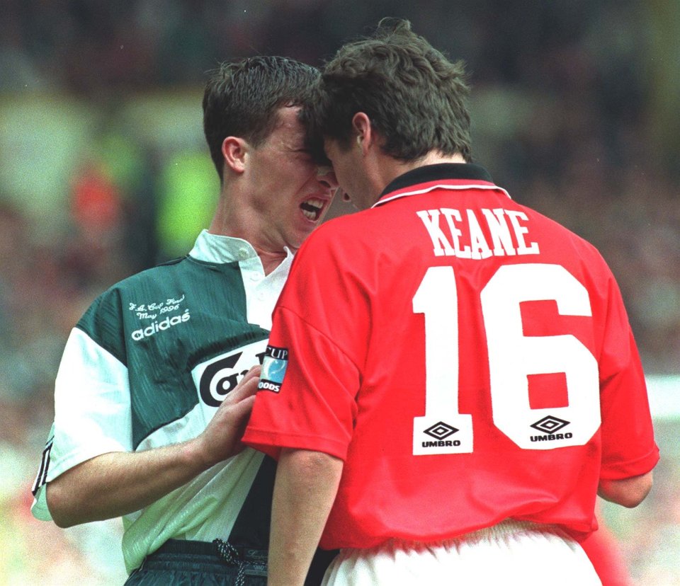 Roy Keane and Robbie Fowler go head to head during an FA Cup final clash 