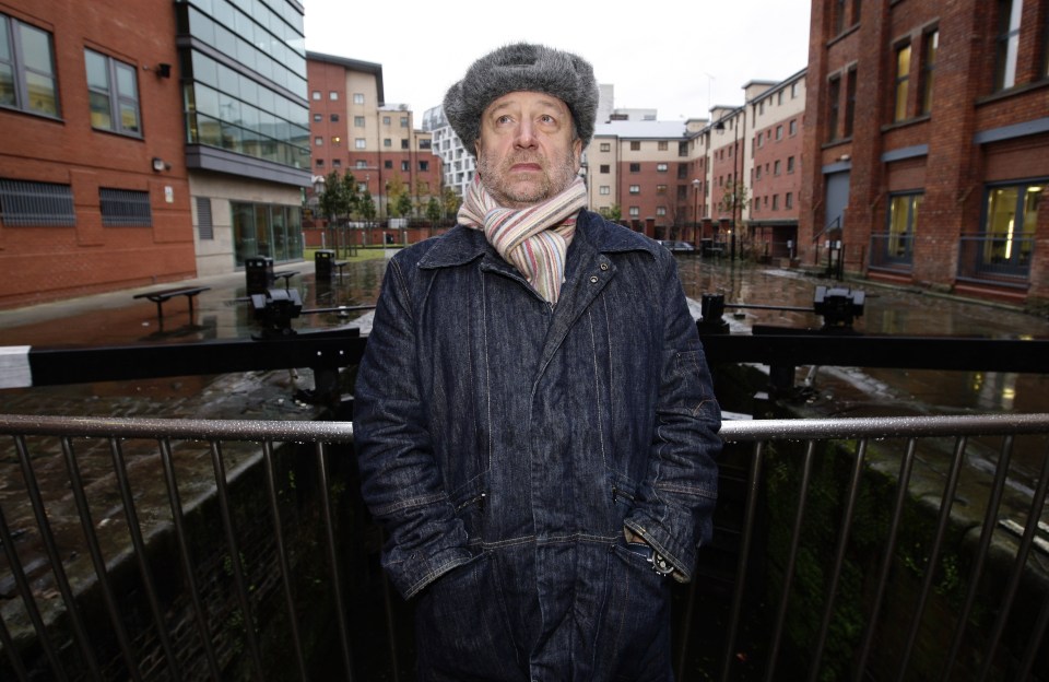 Sadness . . . Peter Hook next to Hacienda Apartments, on the sight of the famous nightclub