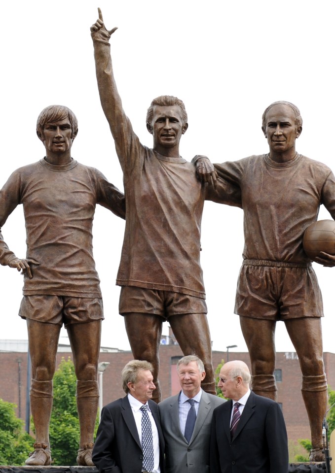 Manchester United's coach Alex Ferguson (centre) poses with Denis Law (left) and Bobby Charlton at the unveiling of a statue of former Manchester United players George Best, Denis Law and Bobby Charlton outside Old Trafford