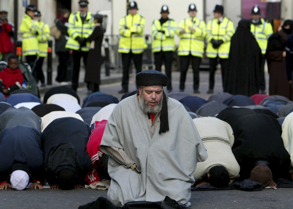  Hate preacher . . . Abu Hamza leads prayers outside the Finsbury Park mosque