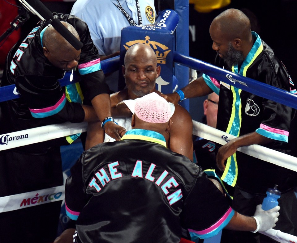 US fighter Hopkins sits in his corner during a break against Sergey Kovalev