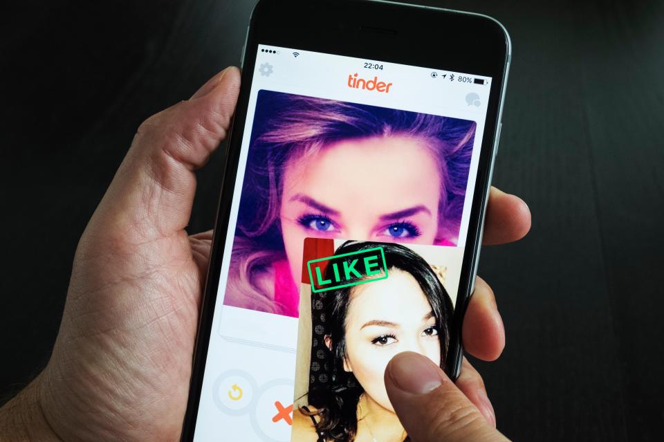 Tinder online dating app on an iPhone 6 Plus smart phone