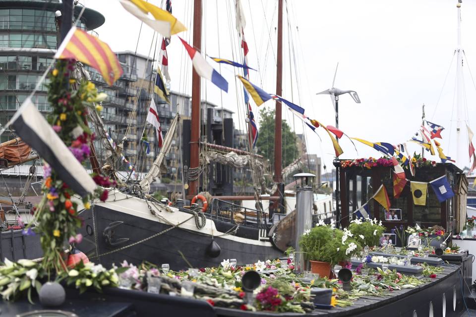  Tributes to murdered Labour MP Jo Cox were placed on the houseboat where she lived with her husband Brendan and their two children