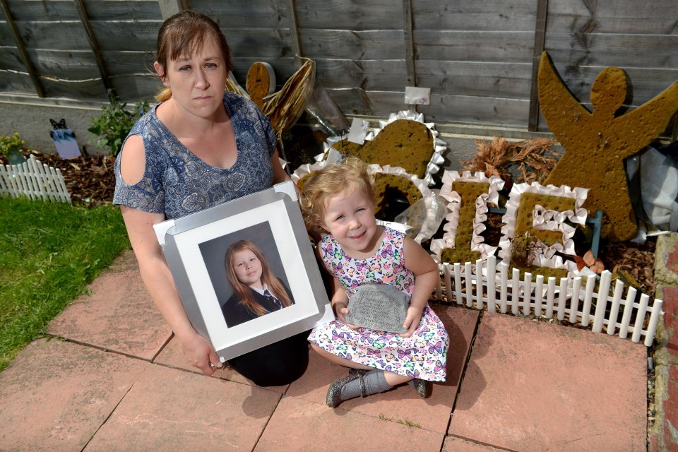  Jodie's mum Nicola by her memorial garden with daughter Iesha, 4