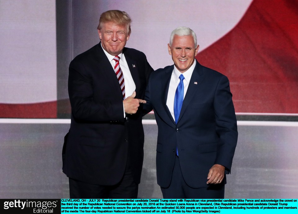 Donald Trump and Pence pictured together on stage at a rally in Cleveland, Ohio