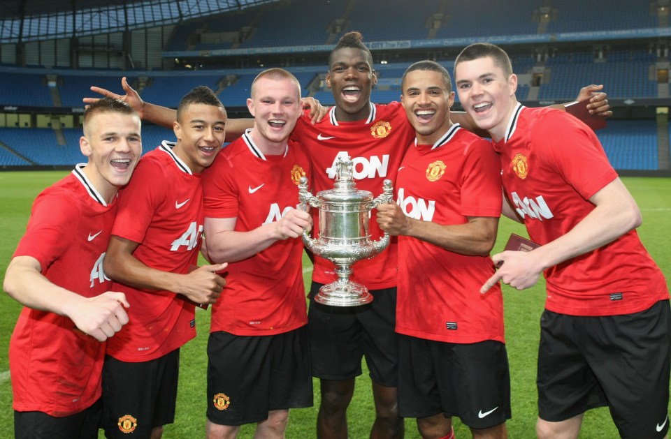 Michael Keane (right) starred in Man United's academy with Jesse Lingard and Paul Pogba