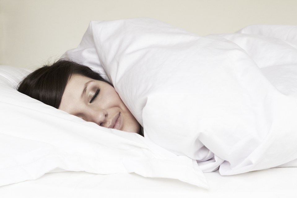 Woman asleep in bed