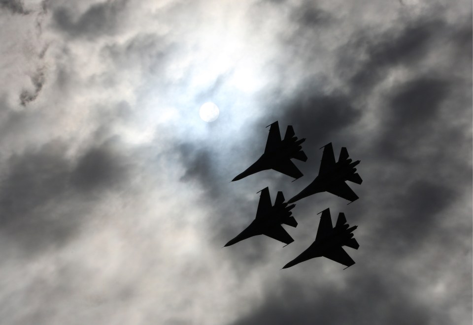 Fighter jets of the Russkiye Vityazi [Russian Knights] aerobatic team perform during an air show 