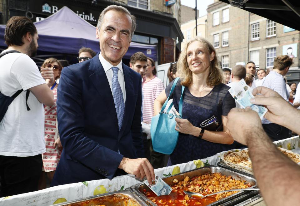  Mark Carney looked a lot happier back in September during a photocall to promote the new £5 note