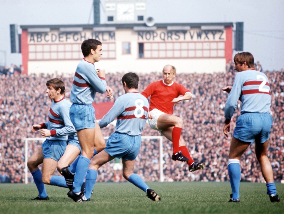 In this still from a 1970s clash between Manchester United and West Ham, Charlton shoots through a crowd of players that included England team-mate Martin Peters