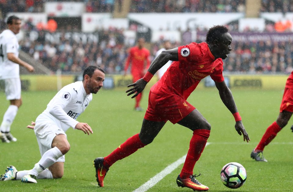  Mane beats Swansea City Leon Britton in Liverpool's last Premier League game