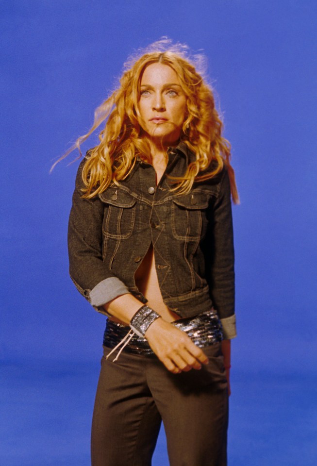  Madonna championing the one-button shirt look