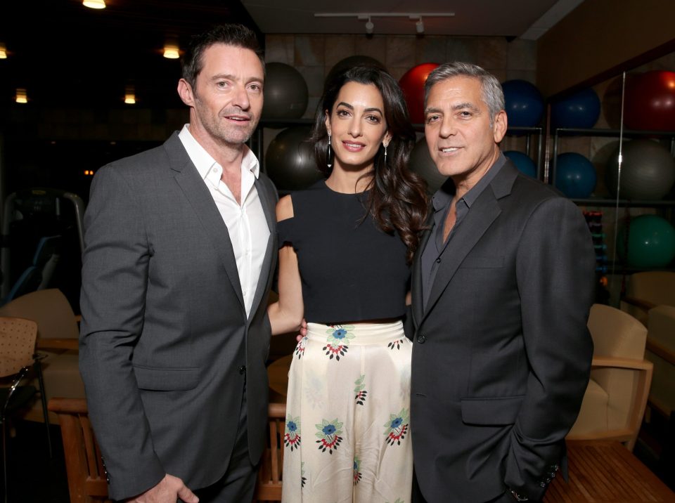  The couple cosied up with Hugh Jackman at the glam event