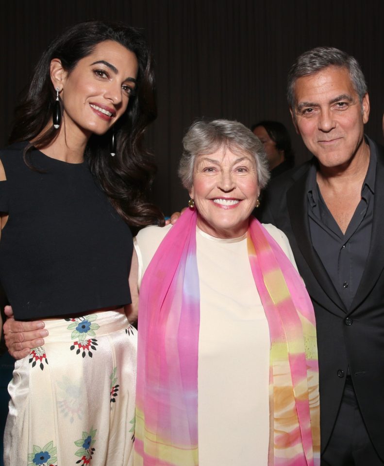  Amal and George pose with Australian singer Helen Reddy