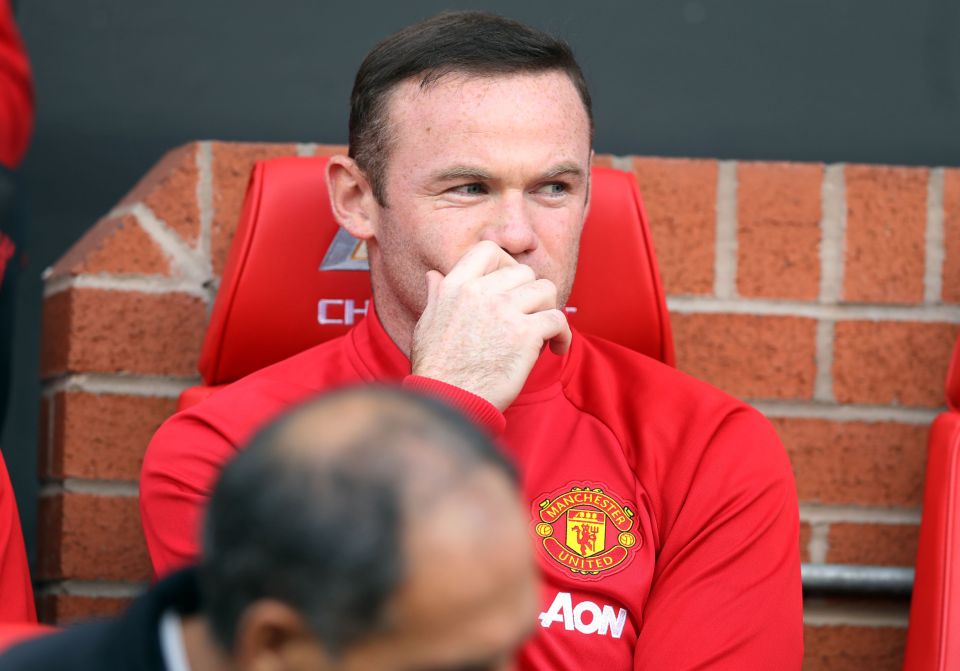 Manchester United's Wayne Rooney sits on the bench