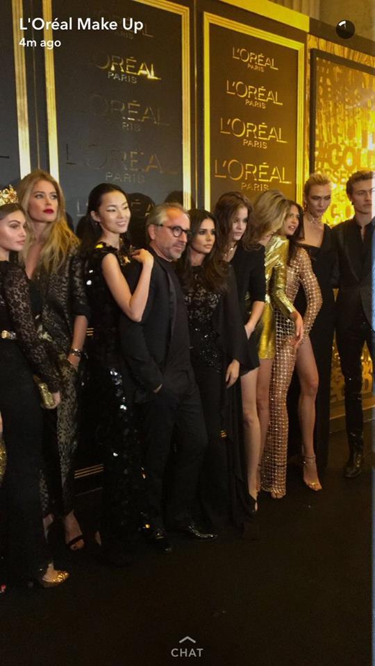 She posed for pictures with some of the most glamorous models in the business