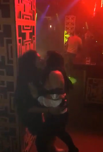 The Geordie Shore girls were caught in a passionate embrace in a nightclub in Lithuania