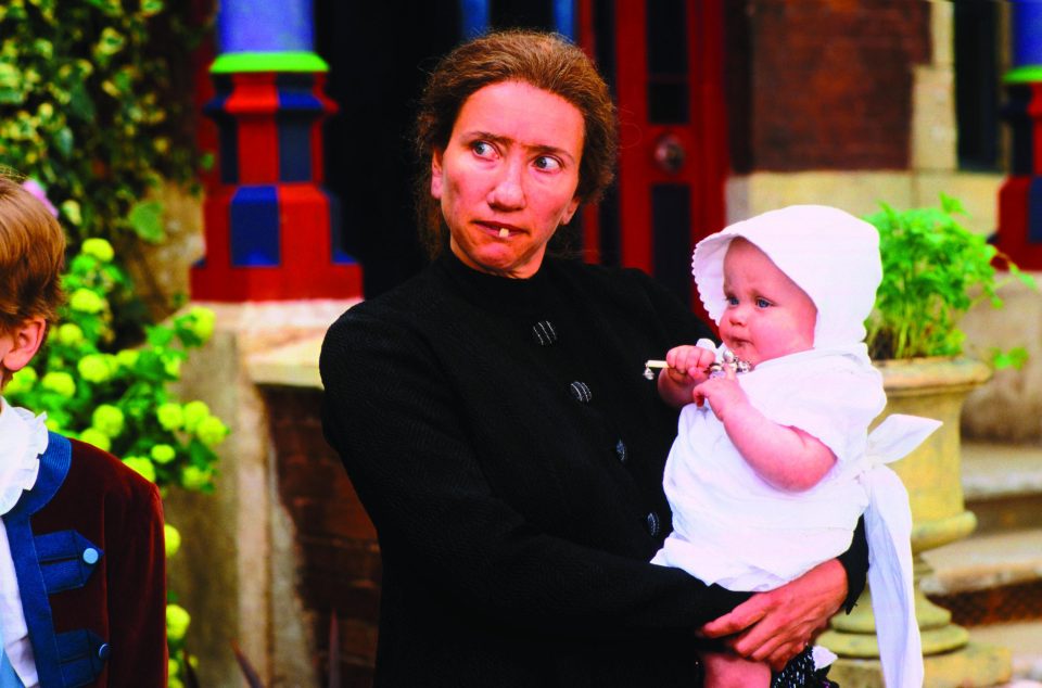 Emma Thompson holding baby Agatha in Nanny McPhee