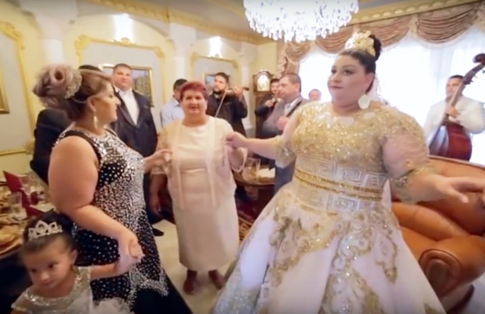 The bride sported a white dress embroidered with gold that cost up to £175K