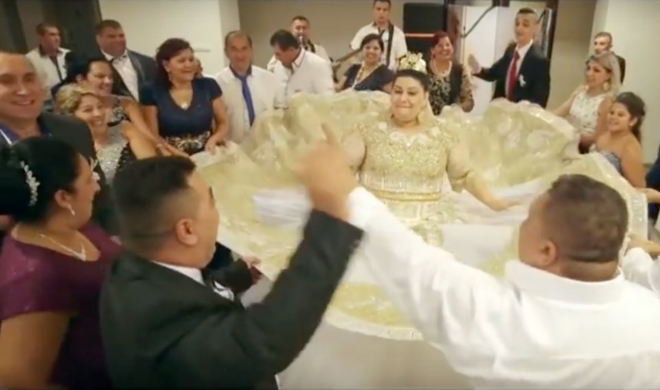 The 19-year-old bride was showered with gold by guests at the ceremony