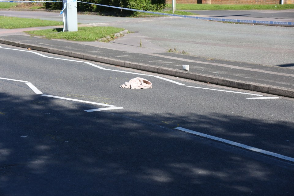  A cloth remains in the roadway following the incident, which saw the teenager airlifted to hospital