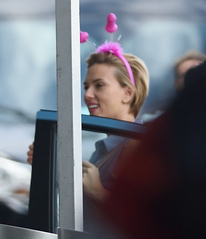 Scarlett Johansson passionately kisses co star wearing sexual headband in NYC