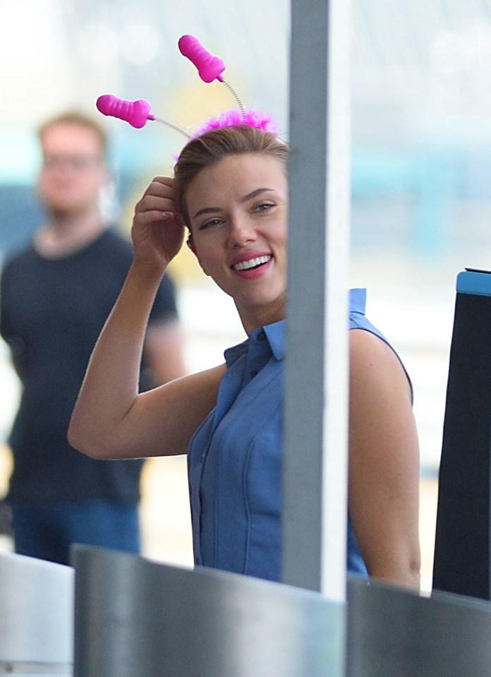 Scarlett Johansson looks like she is having fun wearing this cheeky headband