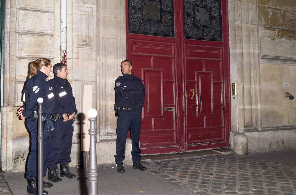  The terrifying robbery occurred at this apartment in Paris. Police are seen here guarding the door of the luxury complex