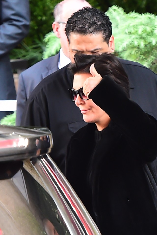 Kim's mother Kris Jenner arrives at her apartment following the ordeal