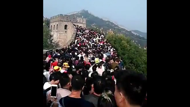  A queue around 98 feet (30 metres)-long was captured by the state-owned China News Servic