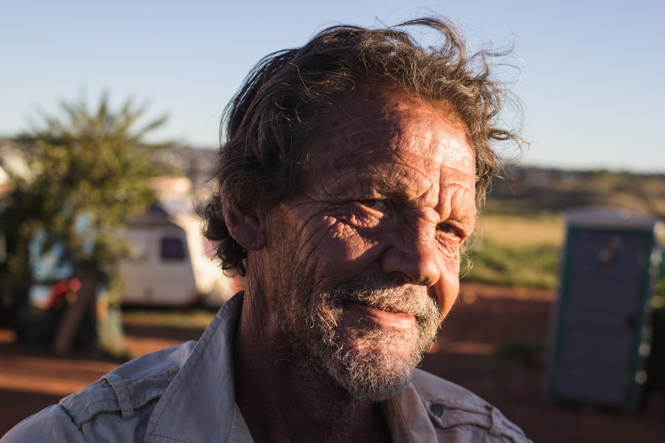  Andre Coetzee spends his time digging through the dumpsite by the entrance to the squatter camp, he finds items that he spends time refurbishing with the idea of selling it