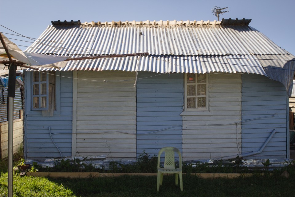  Pictured is a self built wooden shack near the edge of the white squatter camp