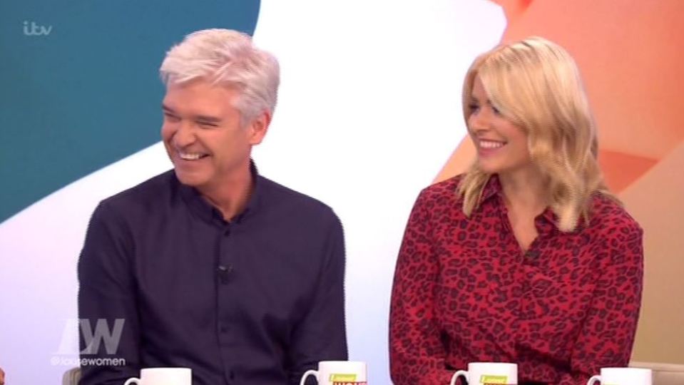  Holly and Phill enjoy a giggle on and off screen together