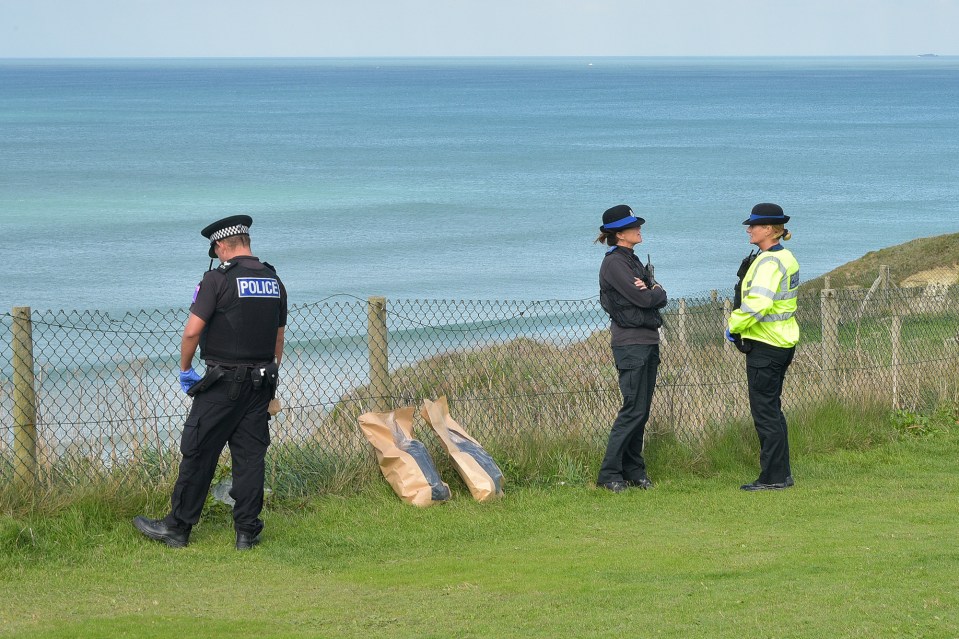  The beach was closed to the public while emergency services removed the body