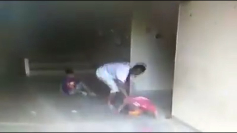 He slams the boy's head onto the hard floor in view of his four-year-old son